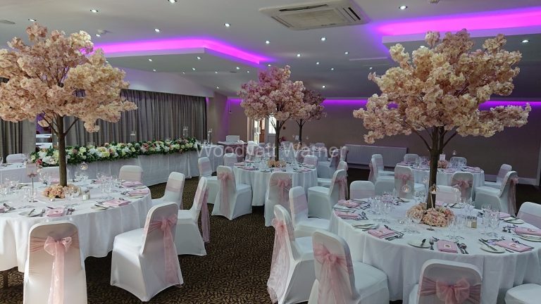 Blush pink blossom trees as table centrepieces for weddings and events