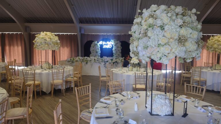 All neutral white wedding table centrepiece flowers