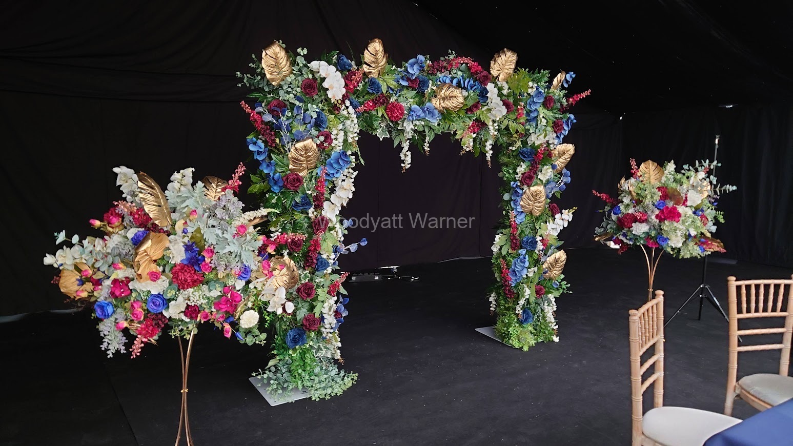 Summer floral arch and centrepiece flowers