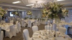 Floral centrepieces and decor Cottons Hotel.JPG