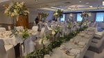 Cottons Hotel Floral centrepieces and top table.JPG